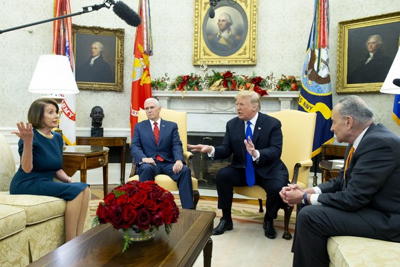 epa07224379 US President Donald J. Trump (C) and US Vice President Mike Pence (2-L) meet with US House Speaker-designate Nancy Pelosi (L) and US Senate Minority Leader Chuck Schumer (R), in the Oval O ...