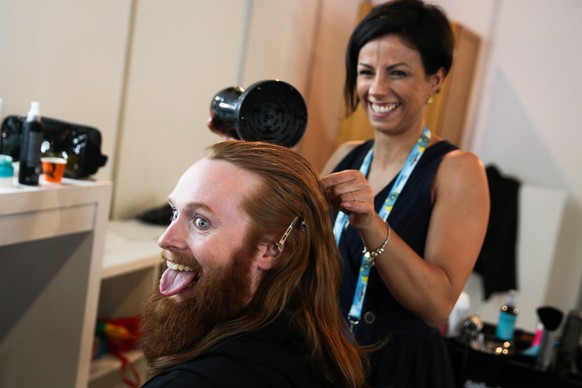 epa06731601 Rasmussen (L) representing Denmark with &#039;Higher Ground&#039; backstage before the Grand Final of the 63rd annual Eurovision Song Contest (ESC) at the Altice Arena in Lisbon, Portugal, ...