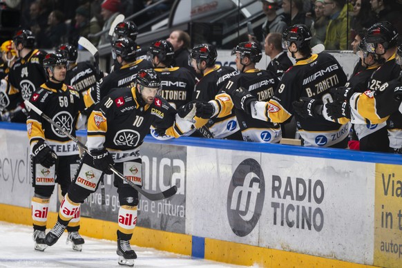 Jiri Sekac (HCL), center, celebrate the 2 - 1 goal, during the regular season of National League Swiss Championship 2025/26 between HC Lugano and Genève Servette HC at the ice stadium Corner Arena in  ...