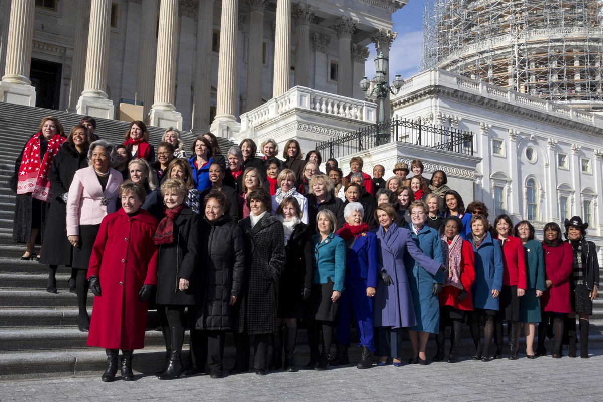 House Minority Leader Nancy Pelosi of Calif., front center in purple, gestures as she poses with the Democratic women of the 114th House of Representatives, Wednesday, Jan. 7, 2015, on the House side  ...