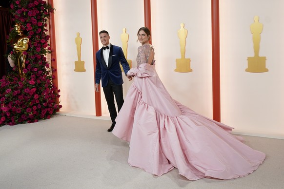 Alexander Dreymon, left, and Allison Williams arrive at the Oscars on Sunday, March 12, 2023, at the Dolby Theatre in Los Angeles. (AP Photo/Ashley Landis)
Alexander Dreymon,Allison Williams