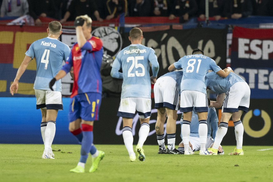 Slovan Bratislava&#039;s Aleksandar Cavric celebrates his goal after scoring the 2-0 with his teammates during the UEFA Europa Conference League group H soccer match between Switzerland&#039;s FC Base ...