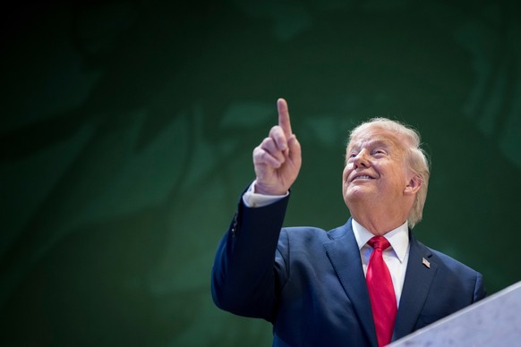 President Donald Trump gestures in the hallway after his special address during the 56th annual meeting of the World Economic Forum, WEF, in Davos, Switzerland, Wednesday, Jan. 21, 2026. (Gian Ehrenze ...