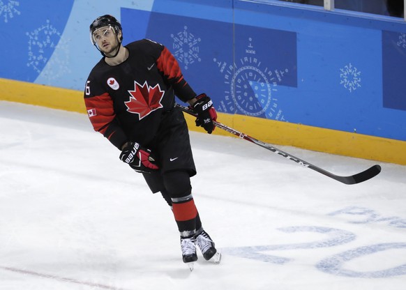 Maxim Noreau (56), of Canada, reacts after failing to score in the penalty shootout against the Czech Republic in the penalty shootout during the overtime period of the preliminary round of the men&#0 ...