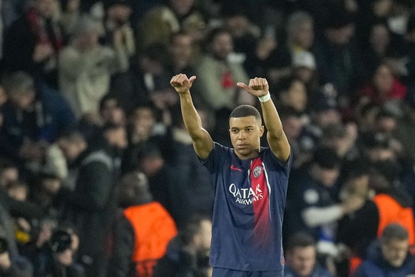 PSG&#039;s Kylian Mbappe celebrates after scoring his side&#039;s opening goal during the Champions League round of 16 first leg soccer match between Paris Saint-Germain and Real Sociedad, at the Parc ...