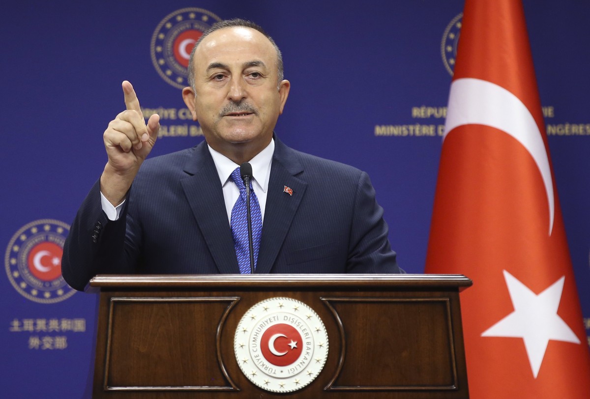 Turkey's Foreign Minister Mevlut Cavusoglu speaks to the media after talks with German Foreign Minister Heiko Maas, in Ankara, Turkey, Tuesday, Aug. 25, 2020. Maas appealed Tuesday for a de-escal ...