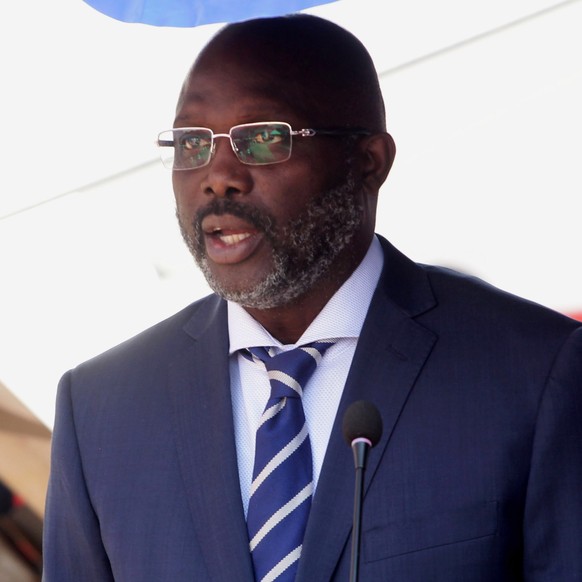epa09713331 Liberian president, George Weah, speaks at the grand launch of the Liberia Telecommunication -LTC Mobile Company at LTC Mobile Building in Monrovia, Liberia, 27 January 2022. The Liberian  ...