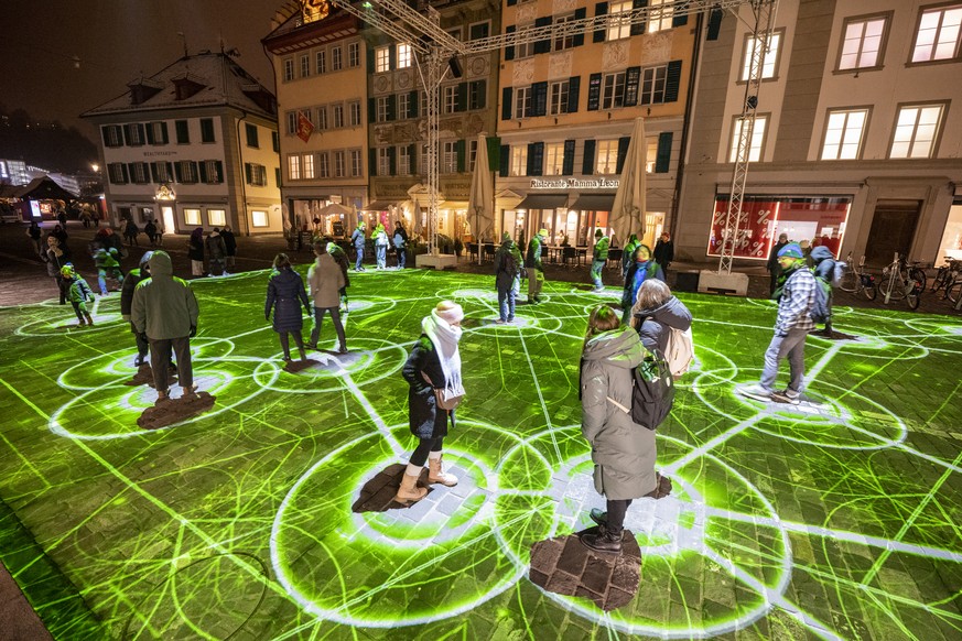 Die Lichtprojektion �Light Connector� des Kuenstlers Ocumbo am Muehlenplatz anlaesslich des Lilu Lichtfestival Luzern vom Donnerstag, 11. Januar 2024 in Luzern. Am Lichtfestival Luzern werden vom 11.  ...