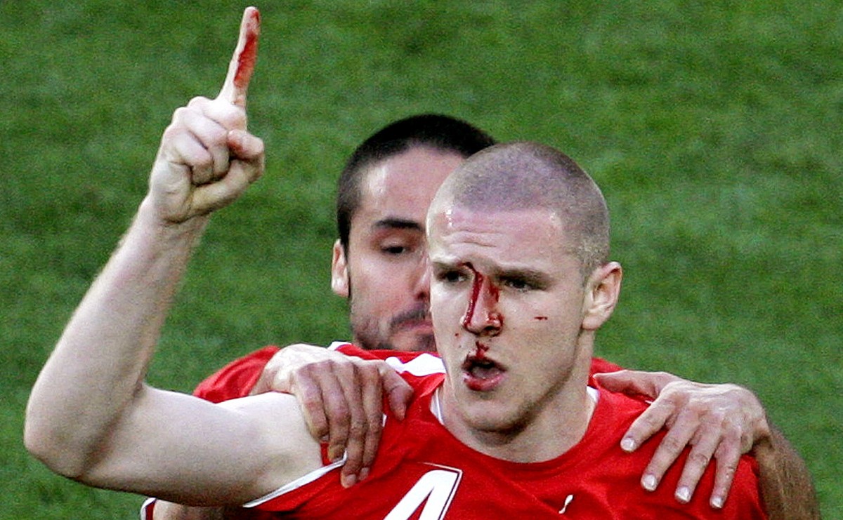 **RETRANSMISSION TO ALTERNATE CROP** Switzerland's Philippe Senderos, right, celebrates after scoring with teammate Ricardo Cabanas during the Switzerland v. South Korea 2006 World Cup Group G so ...