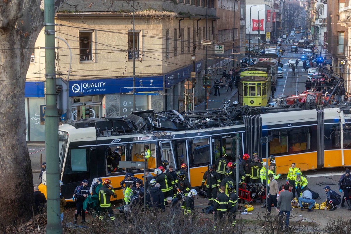 Rescuers at work on the scene of a tram derailment in downtown Milan, Italy, Friday, Feb. 27, 2026. (Stefano Porta/LaPresse via AP)
Italy Tram Derailment