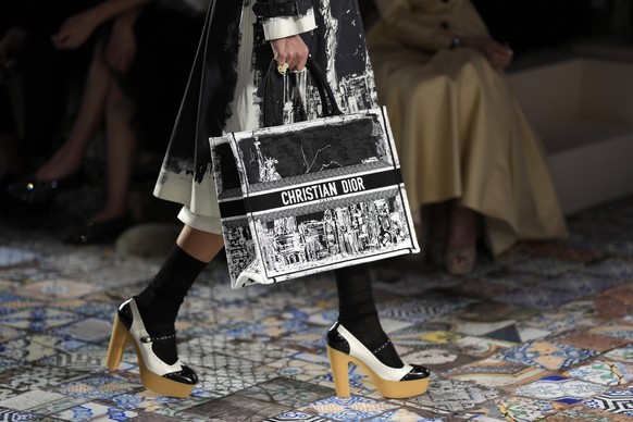 A model walks the runway during the Dior fall 2024 ready to wear presentation on Monday, April 15, 2024, at the Brooklyn Museum in New York. (Photo by Charles Sykes/Invision/AP)