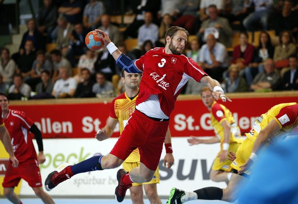 Switzerland&#039;s Daniel Fellmann tries to score during the 2016 Men&#039;s European Championship qualifying handball match between Team Switzerland and Team Fyr Macedonia at the Sporthalle Kreuzblei ...