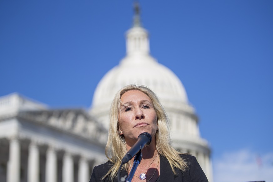 epa08989699 Republican Representative from Georgia Marjorie Taylor Greene responds to a question from the news media during a press conference outside the US Capitol in Washington, DC, USA, 05 Februar ...