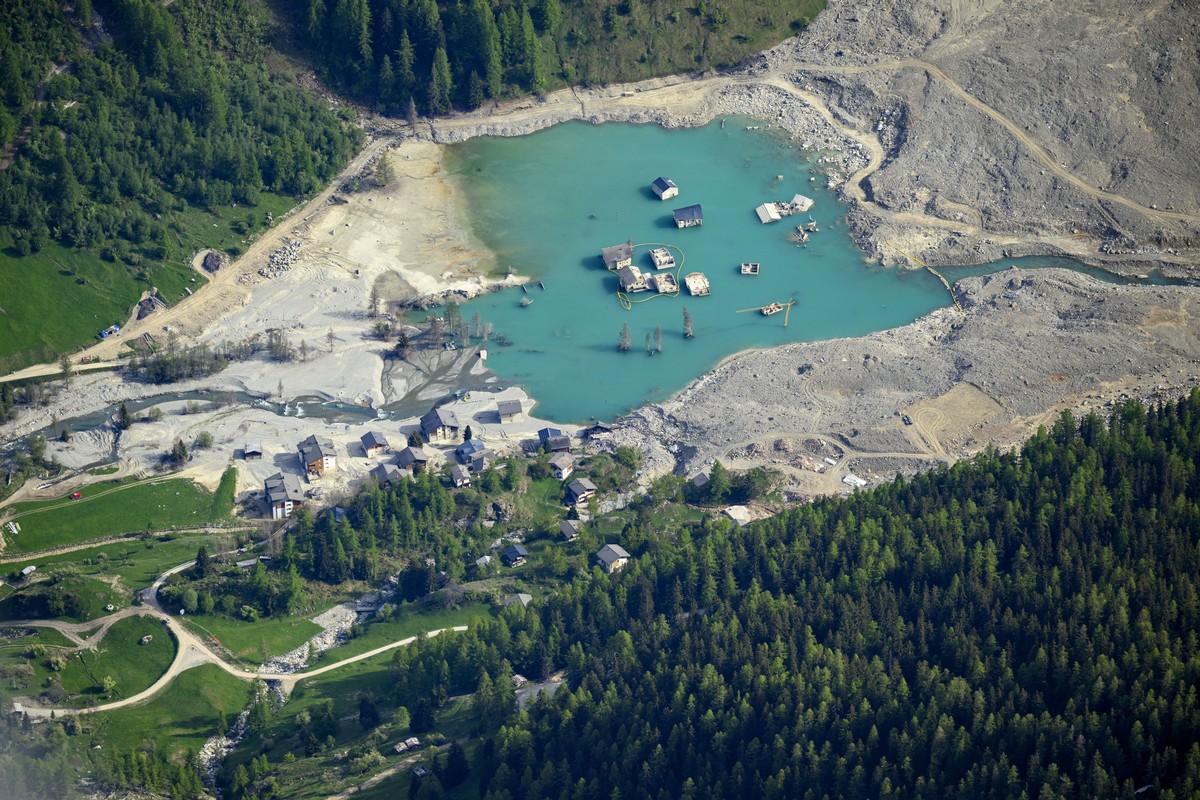 epa12985917 The massive landslide and debris field caused by the collapse of the Birch Glacier, which unleashed tons of rock and ice into the Loetschental valley, pictured one year after the landslide ...