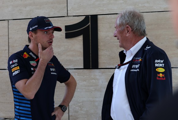 epa11747650 Red Bull motorsport advisor Helmut Marko (R) talks to Dutch driver Max Verstappen of Red Bull Racing before the practice session of the Formula 1 Qatar Grand Prix in Lusail, Qatar, 29 Nove ...