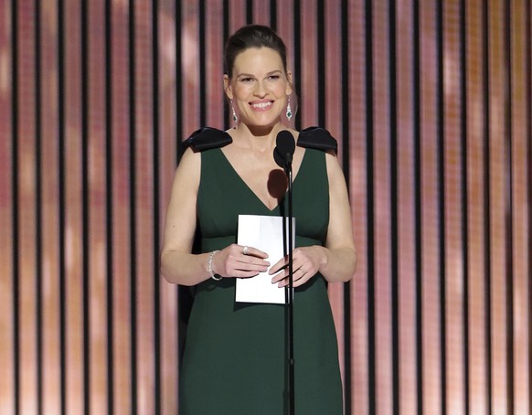 This image released by NBC shows presenter Hilary Swank during the 80th Annual Golden Globe Awards at the Beverly Hilton Hotel on Tuesday, Jan. 10, 2023, in Beverly Hills, Calif. (Rich Polk/NBC via AP ...