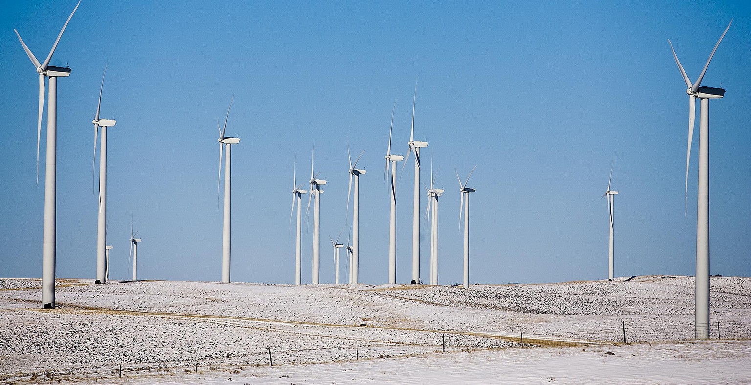 FILE - In this Nov. 2, 2011 file photo, Rocky Mountain Power&#039;s wind farm North of Glenrock, Wyo., captures energy. President Donald Trump&#039;s efforts to roll back coal and climate-change regul ...