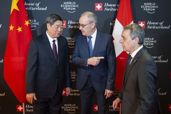 From left to right, Chinese Vice Premier He Lifeng, Switzerland's Federal President Guy Parmelin and Switzerland's Foreign Minister Federal councillor Ignazio Cassis, pictured before a bilat ...