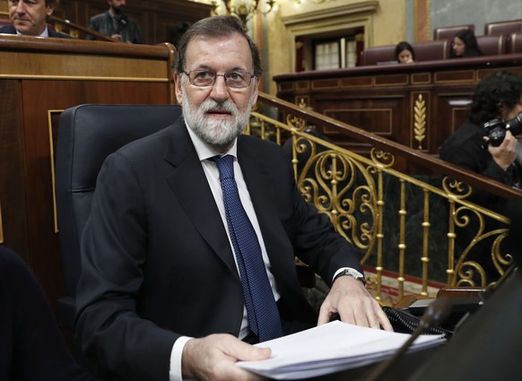 epa06287747 Spanish Prime Minister, Mariano Rajoy, takes his seat prior to the start of the Government&#039;s Question time at the Parliament&#039;s Lower Chamber in Madrid, Spain, 25 October 2017. Th ...