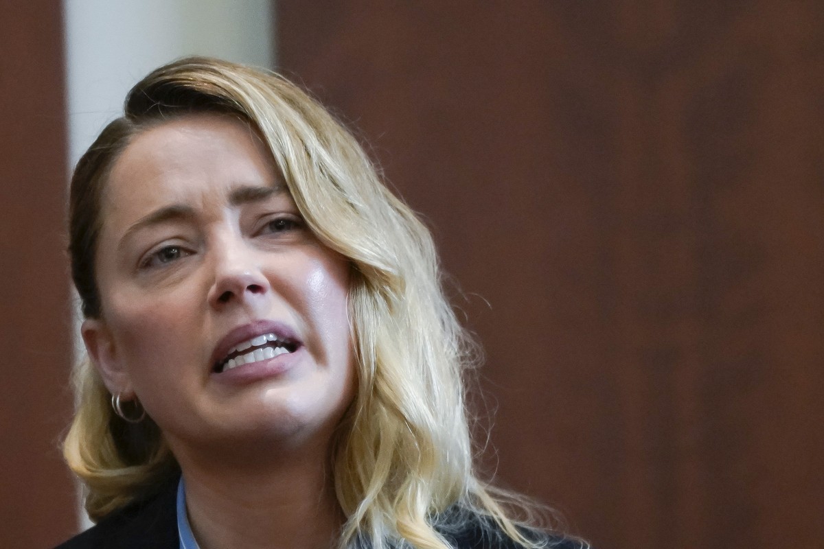 Actor Amber Heard testifies in the courtroom at the Fairfax County Circuit Court in Fairfax, Va., Wednesday May 4, 2022. Actor Johnny Depp sued his ex-wife Heard for libel in Fairfax County Circuit Co ...