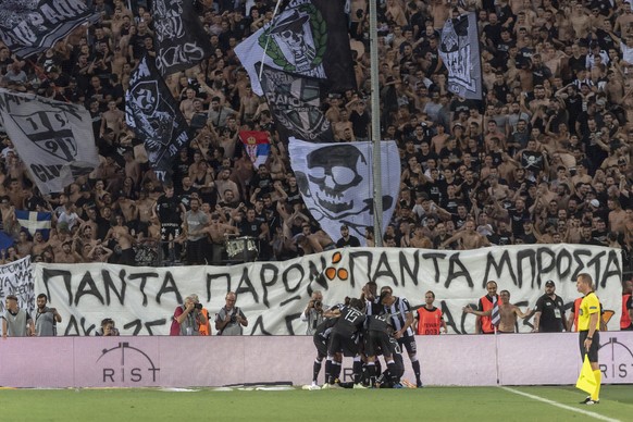 The players of Greece&#039;s PAOK FC cheer after scoring during the UEFA Champions League second qualifying round first leg match between Greece&#039;s PAOK FC and Switzerland&#039;s FC Basel 1893 in  ...