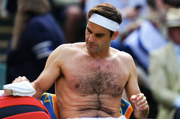 Mandatory Credit: Photo by Javier Garcia Shutterstock (12199110gc) Roger Federer changing his shirt during his quarter-final match Wimbledon Tennis Championships, Day 9, The All England Lawn Tennis an ...