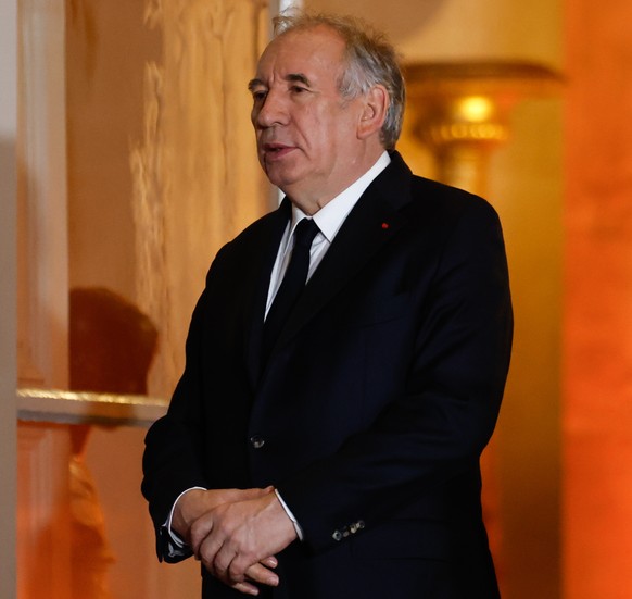 epa11826851 French Prime Minister Francois Bayrou waits for the arrival of Vatican&#039;s Secretary of State Cardinal Pietro Parolin in Hotel Matignon in Paris, France, 15 January 2025. Cardinal Parol ...