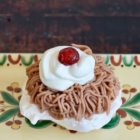 Swiss vermicelli with obligate ornamental cherry.