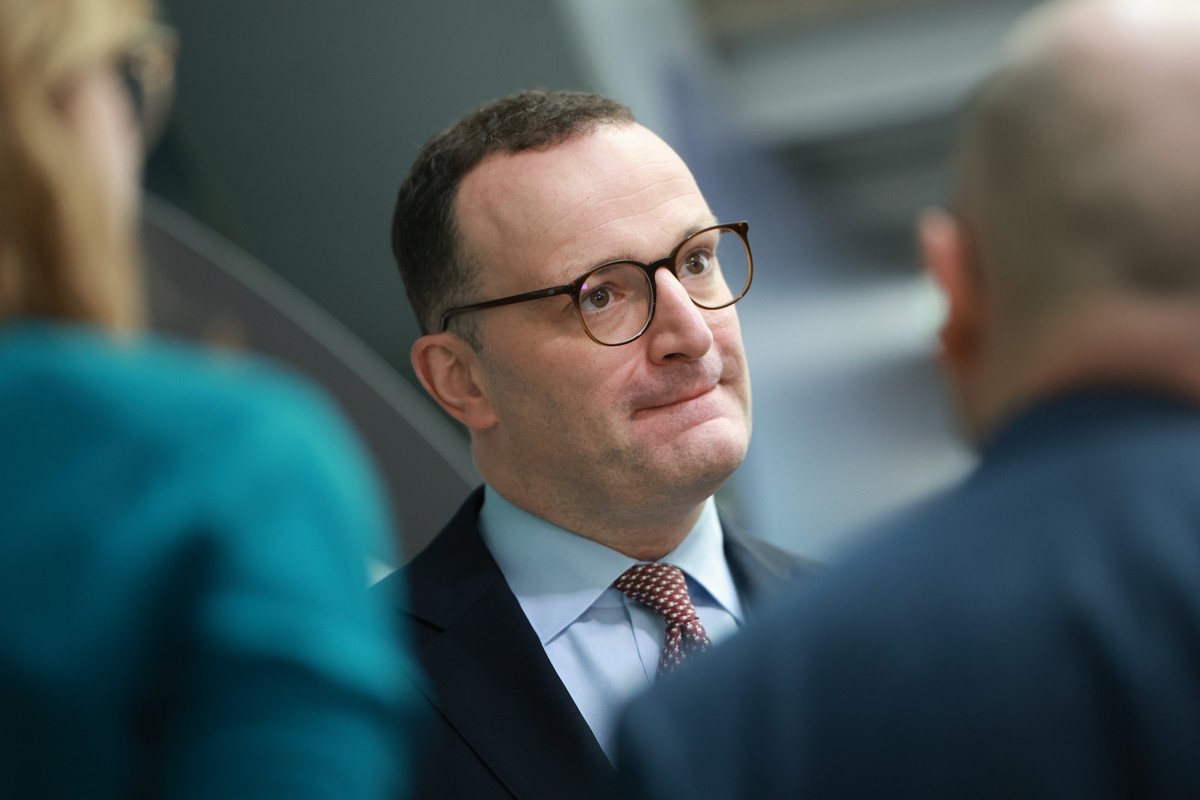 epa12806341 Christian Democratic Union (CDU) faction chairman in the German parliament Bundestag, Jens Spahn, gestures as he talks to journalists upon leaving the CDU headquarters prior to a press con ...