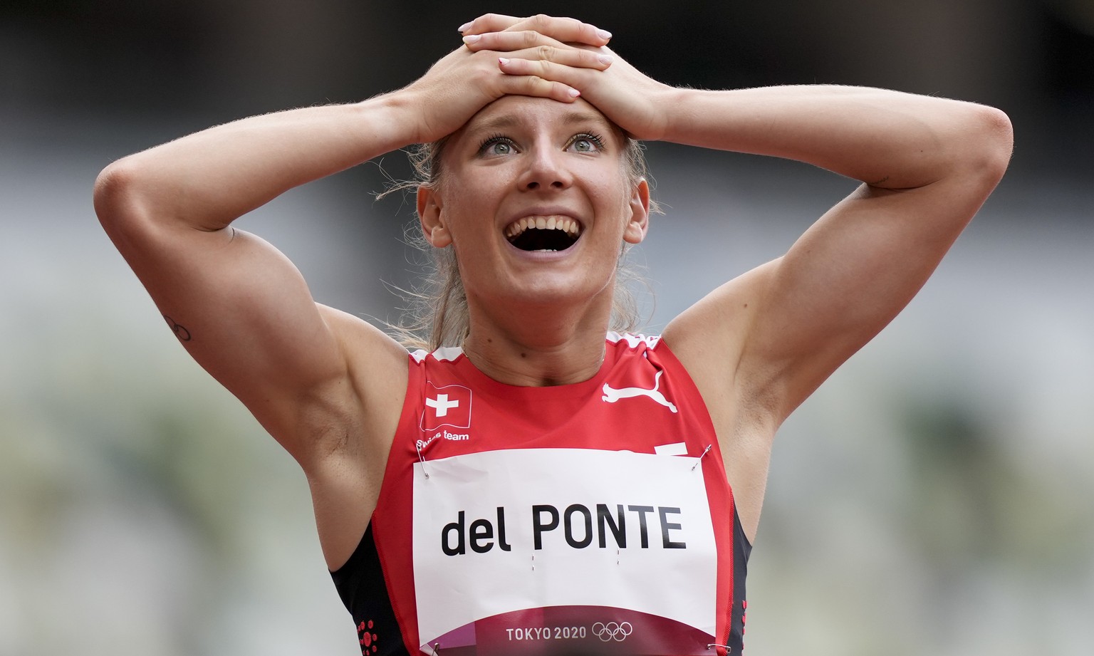 Ajla Del Ponte, of Switzerland, reacts after a heat in the women&#039;s 100-meter run at the 2020 Summer Olympics, Friday, July 30, 2021, in Tokyo. (AP Photo/Martin Meissner)