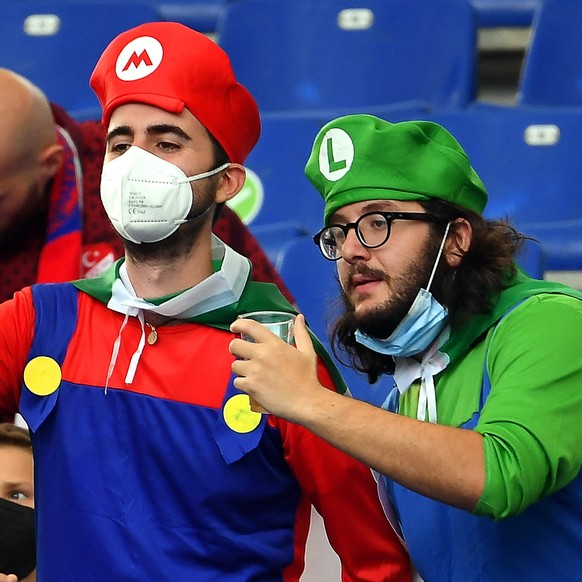 epa09262744 Fans of Italy pose prior to the UEFA EURO 2020 group A preliminary round soccer match between Turkey and Italy at the Olympic Stadium in Rome, Italy, 11 June 2021. EPA/Ettore Ferrari / POO ...