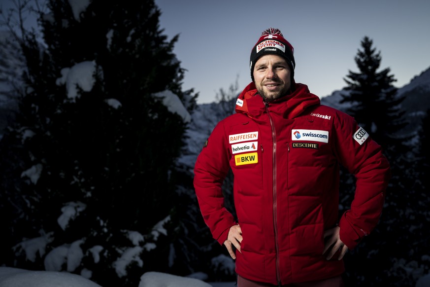 Beat Feuz of Switzerland poses for photographer during a press conference at the Alpine Skiing FIS Ski World Cup in Wengen, Switzerland, Tuesday, January 11, 2022. (KEYSTONE/Jean-Christophe Bott)