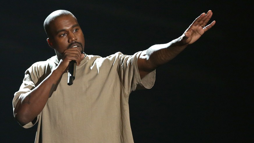 FILE - In this Sunday, Aug. 30, 2015, file photo, Kanye West accepts the video vanguard award at the MTV Video Music Awards at the Microsoft Theater in Los Angeles. After six weeks of streaming exclus ...