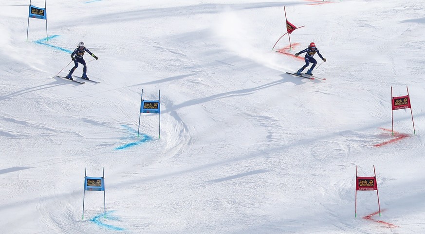 epa08140973 Marta Bassino (L) of Italy and her teammate Federica Brignone in action during the women&#039;s Parallel Giant Slalom race at the FIS Alpine Skiing World Cup event in Sestriere, Italy, 19  ...