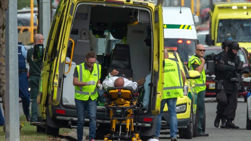epaselect epa07438081 An injured person is loaded in an ambulance following a shooting resulting in multiple fatalies and injuries at the Masjid Al Noor on Deans Avenue in Christchurch, New Zealand, 1 ...