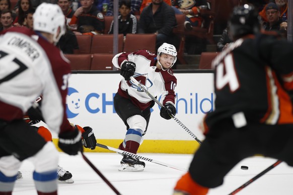 Colorado Avalanche&#039;s Sven Andrighetto, of Switzerland, passes the puck during the first period of an NHL hockey game against the Anaheim Ducks on Sunday, April 1, 2018, in Anaheim, Calif. (AP Pho ...
