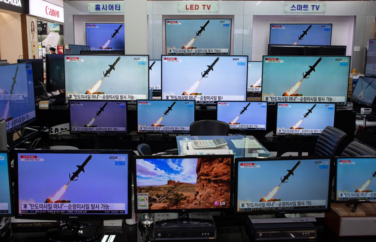 epa09092585 TV screens show news broadcast at the Yongsan electronics market in Seoul, South Korea, 24 March 2021. US President Joe Biden's administration officials on 23 March reportedly confirm ...