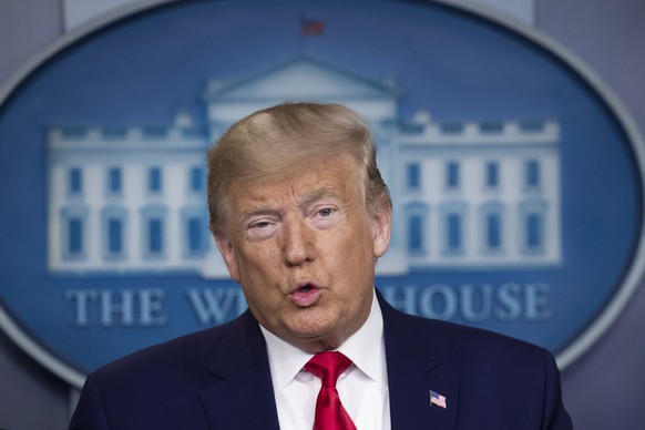 epa08260246 US President Donald J. Trump holds a news conference with members of the White House task force on the coronavirus, to discuss outbreak and the US response to mitigate the spread of the il ...