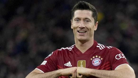Bayern&#039;s Robert Lewandowski celebrates scoring his side&#039;s fifth goal during the Champions League group E soccer match between Bayern Munich and Benfica Lisbon in Munich, Germany, Tuesday, No ...