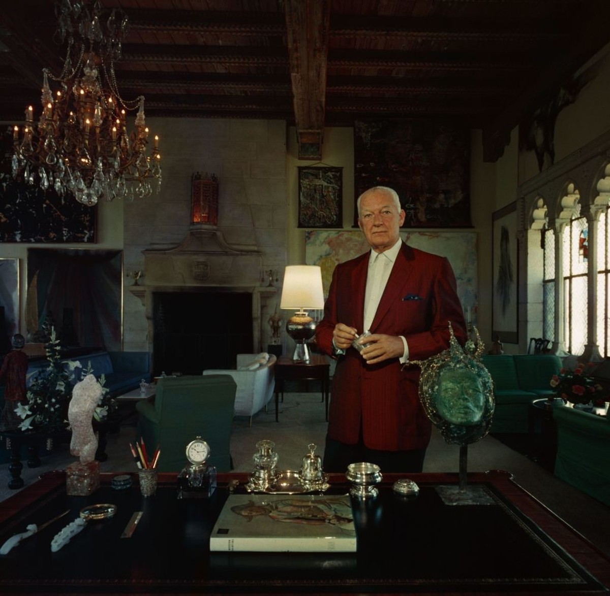 1968: Art collector, Patrick J Lannan surrounded by objets d'art in his Worth Avenue apartment, Palm Beach A Wonderful Time - Slim Aarons. (Photo by Slim Aarons/Getty Images)