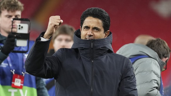 PSG President Nasser Al-Khelaifi celebrates after the Champions League round of 16 second leg soccer match between Liverpool and Paris Saint-Germain at Anfield in Liverpool, England, Tuesday, March 11 ...