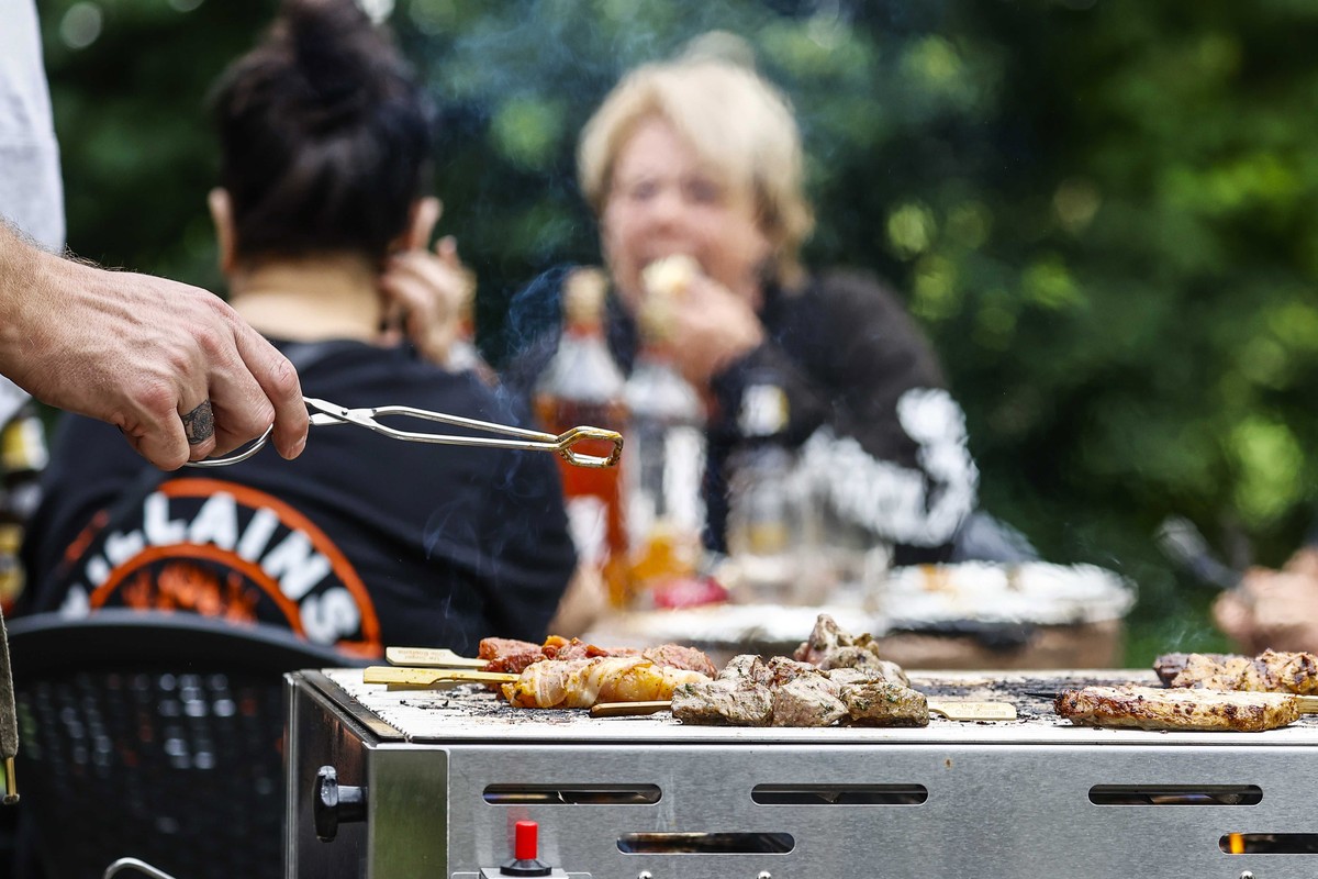 epa08579432 Ambience image of the barbecue at motor camping 't Witveen in Eastermar, The Netherlands, 01 August 2020. Only motorcyclists are welcome at the campsite. EPA/VINCENT JANNINK