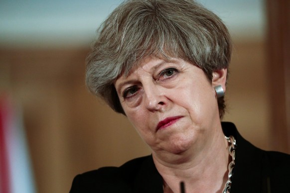 epa06037667 British Prime Minister Theresa May during a press conference after a meeting with new Taoiseach Irish Prime Minister Leo Varadkar (not seen) at 10 Downing Street in London, Britain, 19 Jun ...