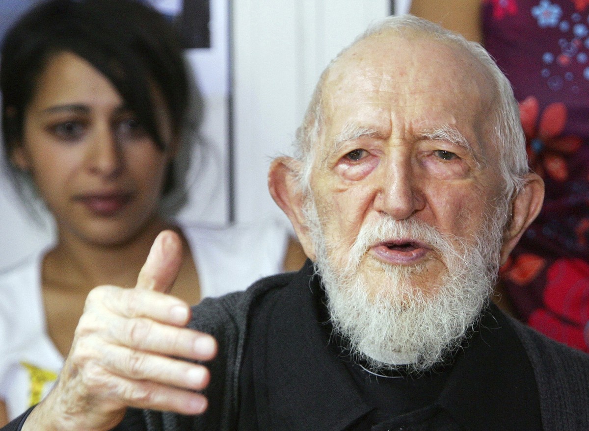 FILE - Abbe Pierre addresses journalists in his home of Alfortville, east of Paris, on Aug. 5, 2005. Several women have accused late French priest Abbe Pierre of sexual assault or harassment, his foun ...