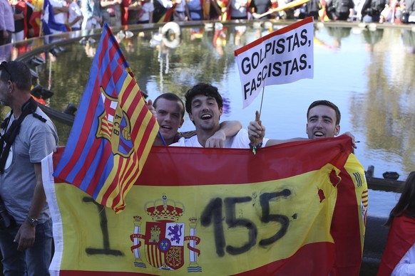 epa06296663 Participants pose during a protest called by the Societat Civil Catalana (lit: Catalan Civil Society) under the slogan &#039;We all are Catalonia&quot; against the unilateral declaration o ...