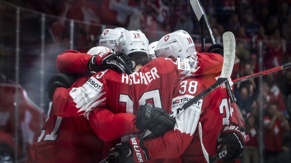 Switzerland's Kevin Fiala and the team celebrates after scoring 1:0 during the game between Switzerland and Austria, at the IIHF 2019 World Ice Hockey Championships, at the Ondrej Nepela Arena in Bratislava, Slovakia, on Thusday, May 14, 2019. (KEYSTONE/Melanie Duchene)