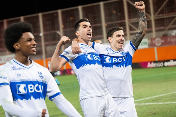 Noe Dussenne (LS) left, celebrate the 1 - 3 goal with Olivier Custodio (LS), during the Super League soccer match FC Lugano against FC Lausanne Sport, at the Cornaredo Stadium in Lugano, Sunday, Decem ...