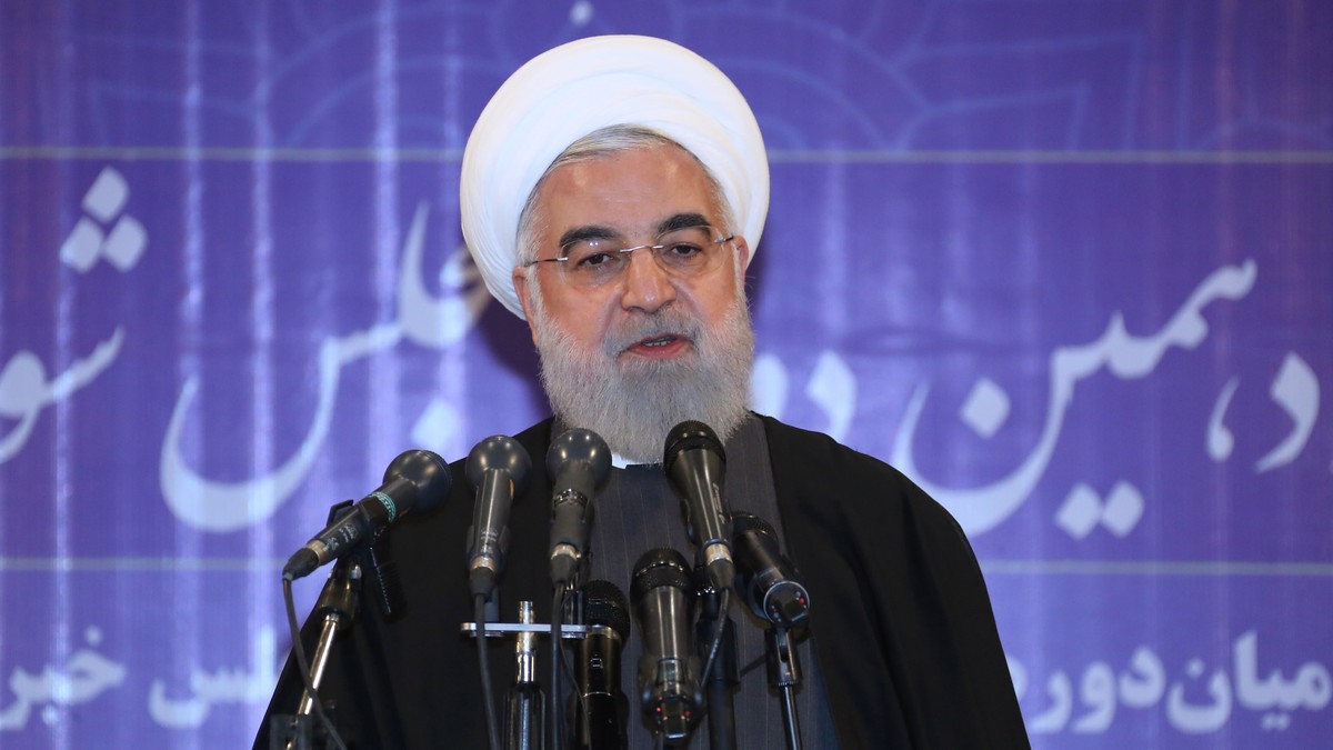 epa08233943 A handout picture made available by Iran's Presidential Office shows Iranian President Hassan Rouhani holding a press conference after casting his vote at a polling station during the ...