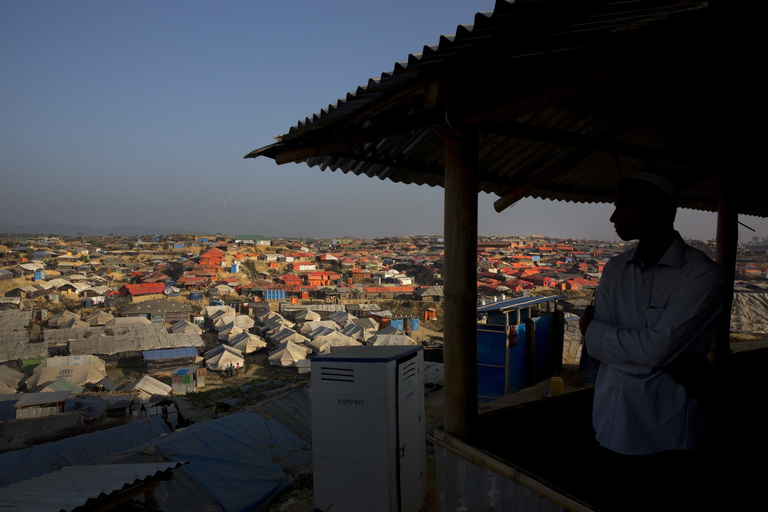 A Rohingya Muslim looks out from a Mosque after offering Friday prayers at Kutupalong refugee camp, near Cox&#039;s Bazar, Bangladesh, Friday, Jan. 19, 2018. A Bangladesh official says Rohingya refuge ...