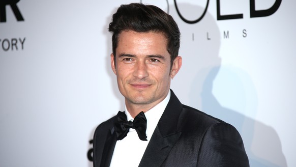 Actor Orlando Bloom poses for photographers upon arrival at the amfAR Cinema Against AIDS benefit at the Hotel du Cap-Eden-Roc, during the 69th Cannes international film festival, Cap d&#039;Antibes,  ...